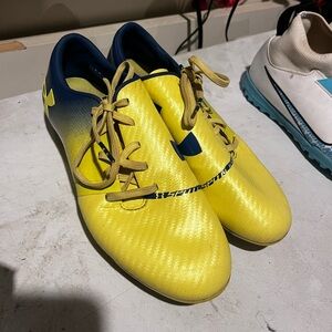Yellow soccer cleats